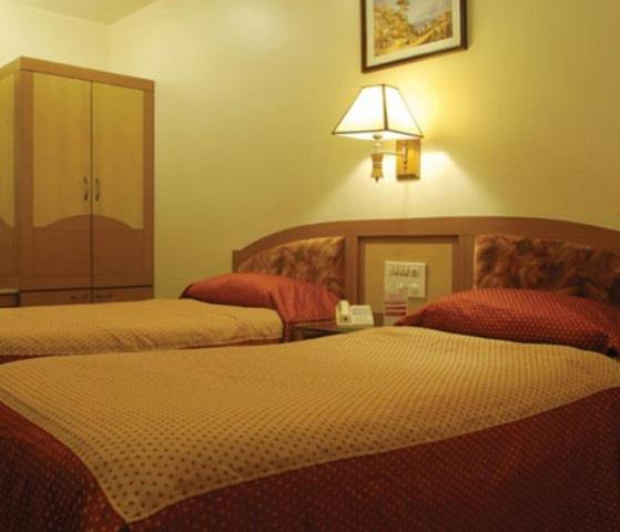 The Ambience Hotel Poona Kamer foto